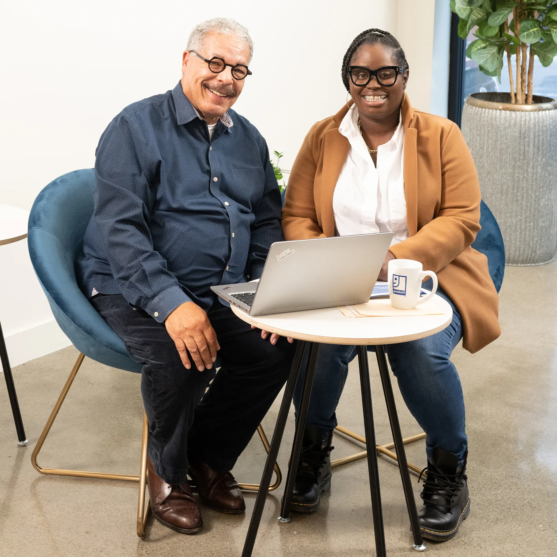 SCSEP participant receiving digital literacy and enrollment assistance from a Palmetto Goodwill coach for senior job training.